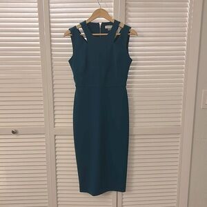 Calvin Klein dress, size 4. Gold zipper and slit in back. blue/green color.